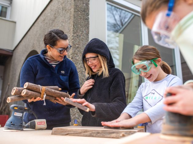 Students learning about woodworking.