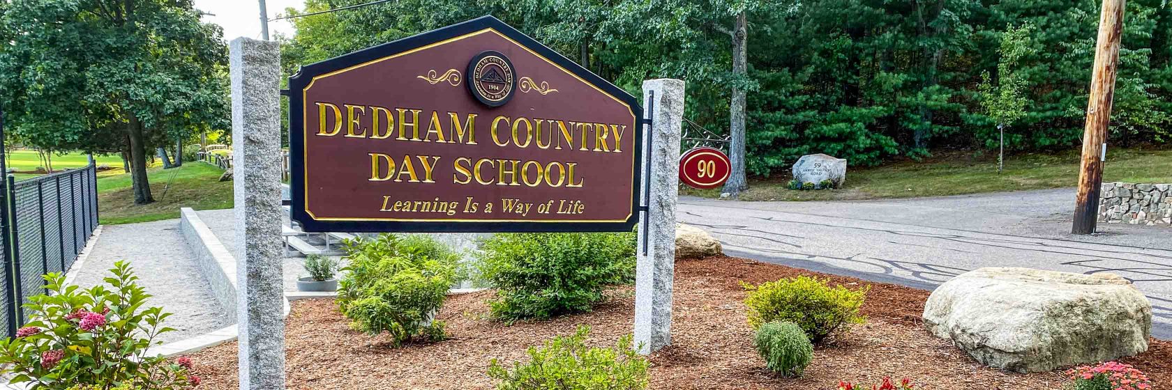 The front sign of Dedham Country Day School.