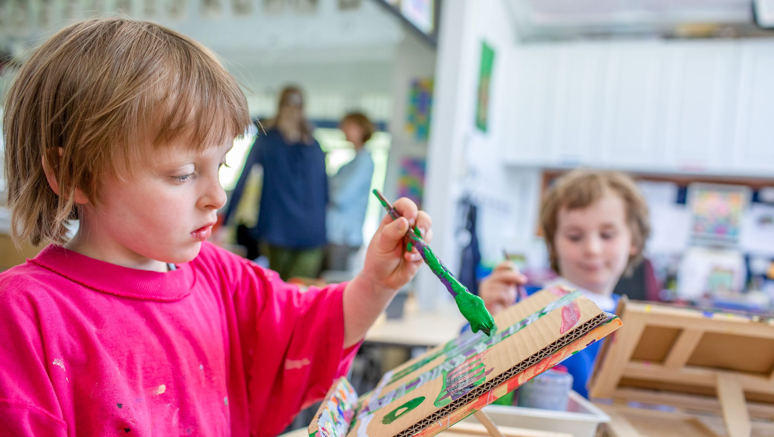 A student working on a painting.