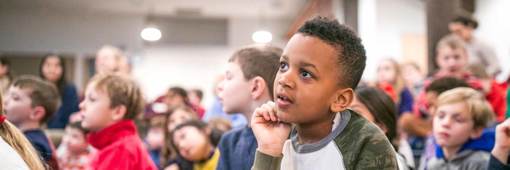 A student listening during a presentation.