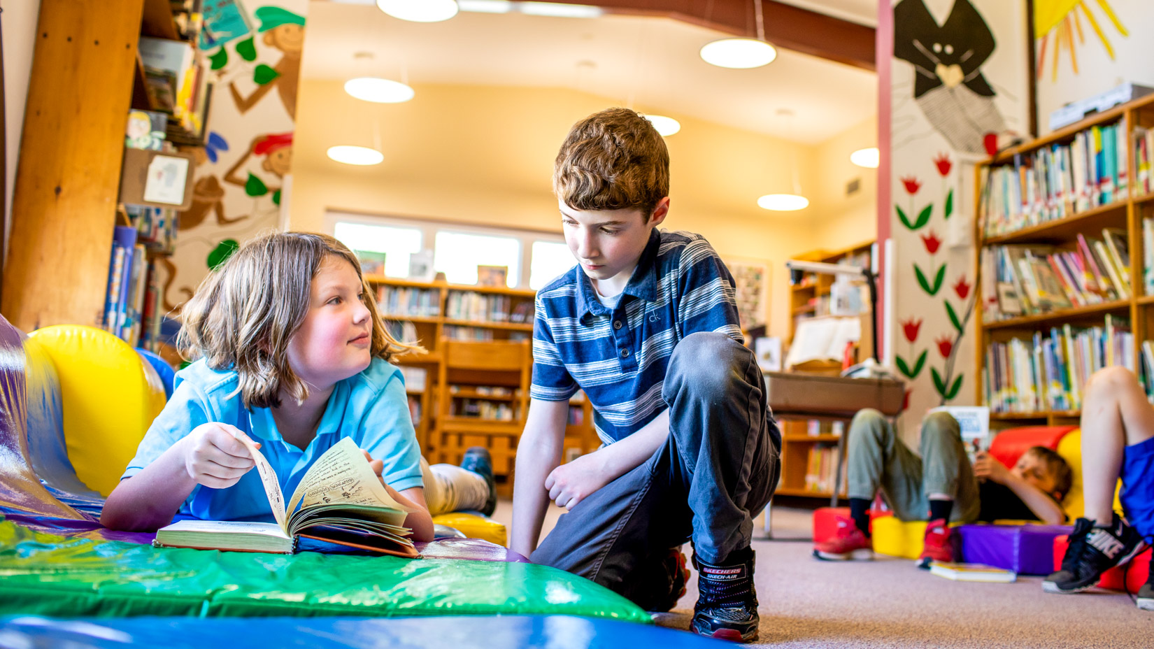 Students reading books in the library