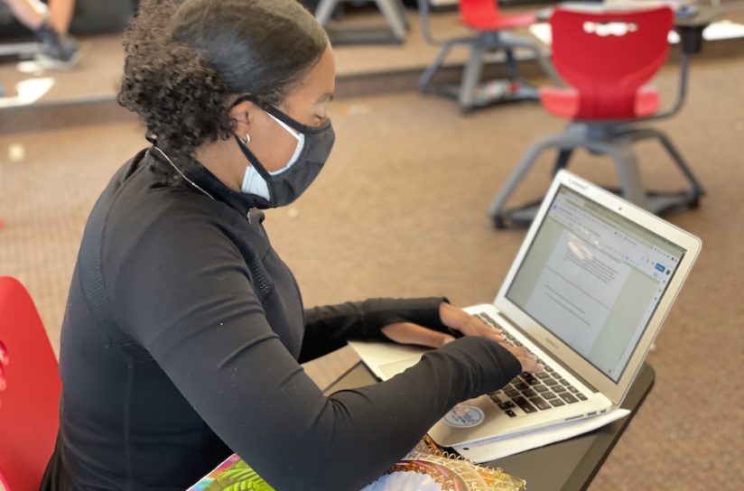 Student working on a laptop computer