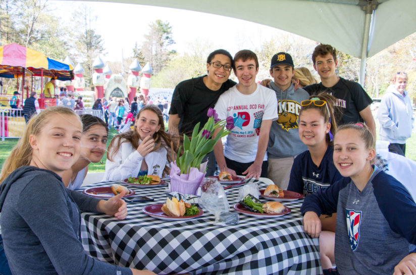 Alumni at an event socializing