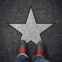 feet standing on a star