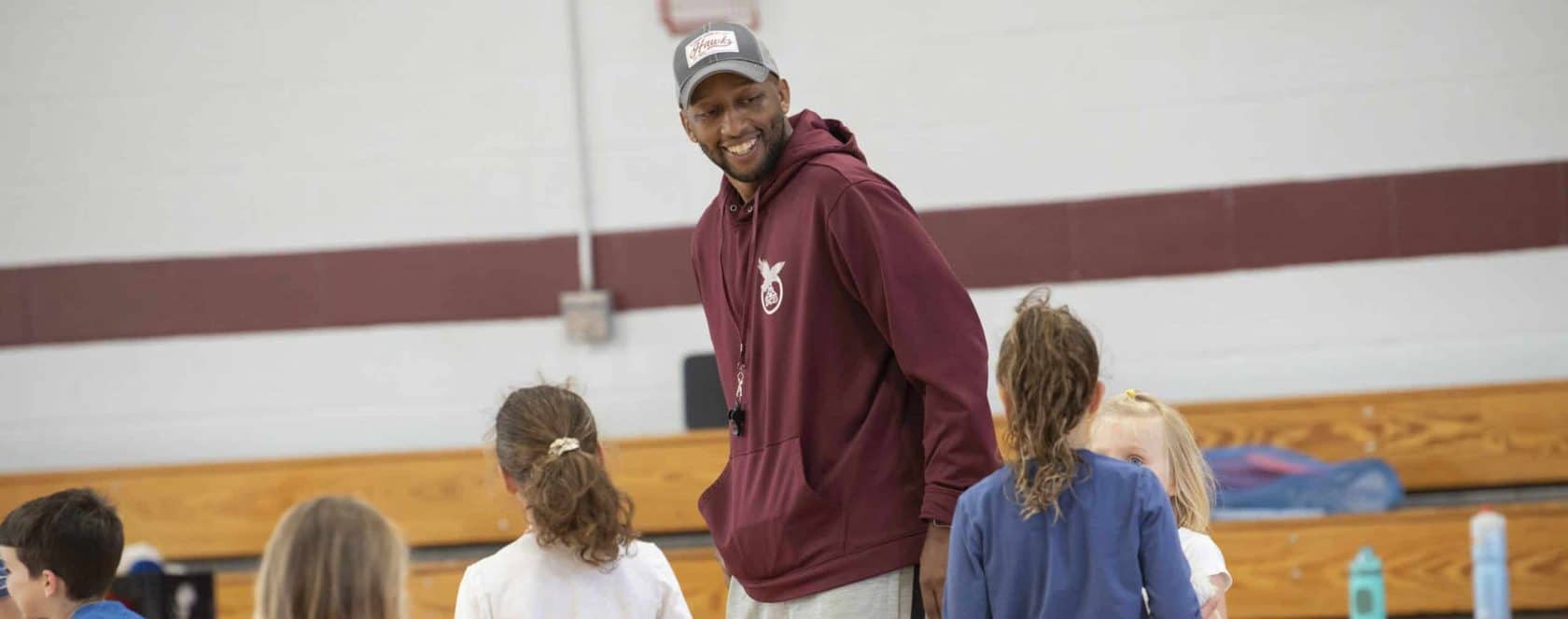 Marcus Nelson coaches PE