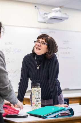 A faculty member in a classroom