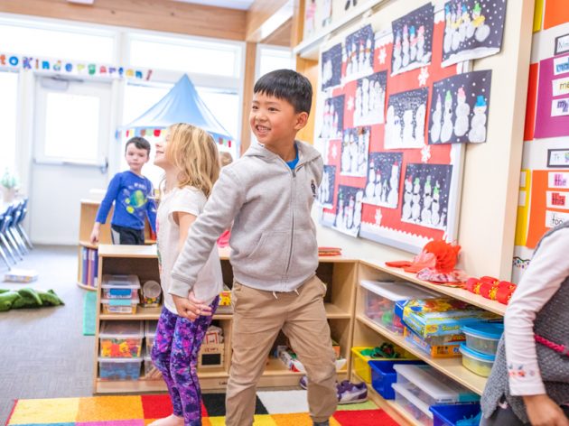 A student having fun in the classroom.