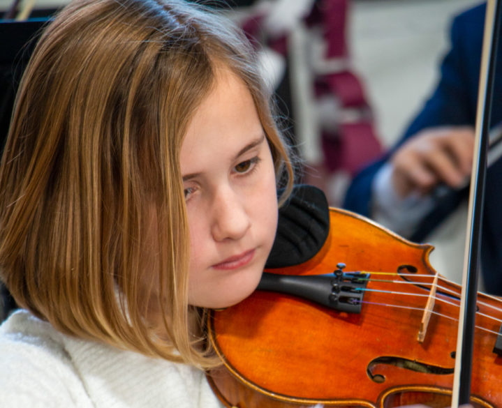 A student playing the violin