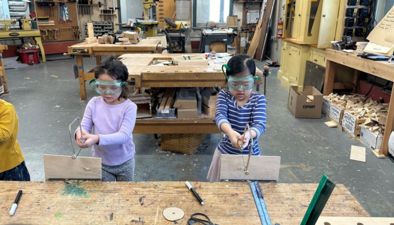 PreK Students working in the woodshop